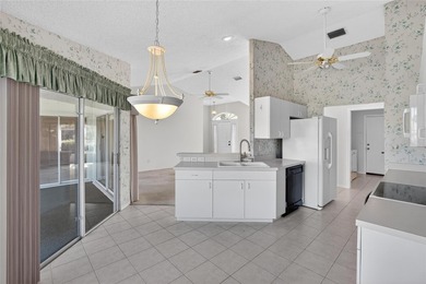 Under contract-accepting backup offers. Welcome to 331 Caloosa on Caloosa Greens Executive Golf Course in Florida - for sale on GolfHomes.com, golf home, golf lot