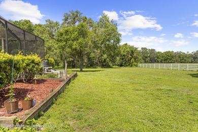 Located in the highly desirable Dogwood Estates golf course on Brooksville Country Club At Majestic Oaks in Florida - for sale on GolfHomes.com, golf home, golf lot