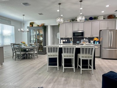 Coastal Sophistication Meets Designer Detail: Experience on LPGA International Golf Course in Florida - for sale on GolfHomes.com, golf home, golf lot