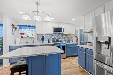 Nestled in the heart of Windjammer Village, 34 Spinnaker Lane is on Indian Wells Golf Course in South Carolina - for sale on GolfHomes.com, golf home, golf lot