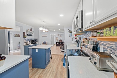 Nestled in the heart of Windjammer Village, 34 Spinnaker Lane is on Indian Wells Golf Course in South Carolina - for sale on GolfHomes.com, golf home, golf lot