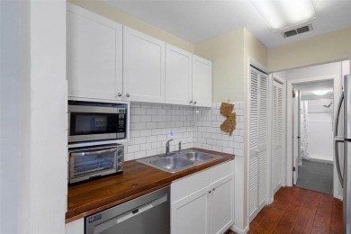 Embrace quintessential Florida waterfront living in this on Tarpon Springs Golf Course in Florida - for sale on GolfHomes.com, golf home, golf lot