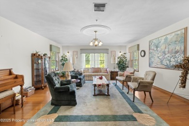 Located in the highly desirable Dogwood Estates golf course on Brooksville Country Club At Majestic Oaks in Florida - for sale on GolfHomes.com, golf home, golf lot