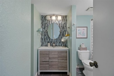 Embrace quintessential Florida waterfront living in this on Tarpon Springs Golf Course in Florida - for sale on GolfHomes.com, golf home, golf lot