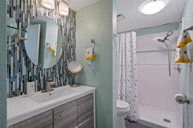 Embrace quintessential Florida waterfront living in this on Tarpon Springs Golf Course in Florida - for sale on GolfHomes.com, golf home, golf lot