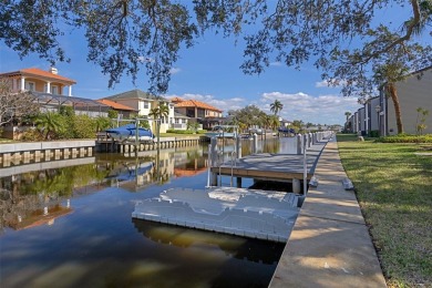 Embrace quintessential Florida waterfront living in this on Tarpon Springs Golf Course in Florida - for sale on GolfHomes.com, golf home, golf lot