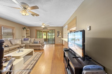 Located in the highly desirable Dogwood Estates golf course on Brooksville Country Club At Majestic Oaks in Florida - for sale on GolfHomes.com, golf home, golf lot