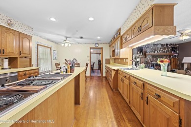 Located in the highly desirable Dogwood Estates golf course on Brooksville Country Club At Majestic Oaks in Florida - for sale on GolfHomes.com, golf home, golf lot