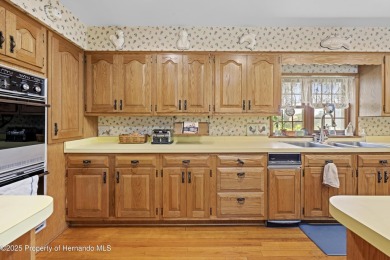 Located in the highly desirable Dogwood Estates golf course on Brooksville Country Club At Majestic Oaks in Florida - for sale on GolfHomes.com, golf home, golf lot