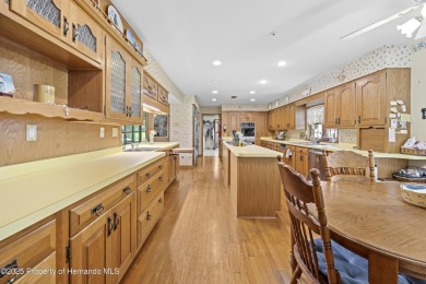 Located in the highly desirable Dogwood Estates golf course on Brooksville Country Club At Majestic Oaks in Florida - for sale on GolfHomes.com, golf home, golf lot