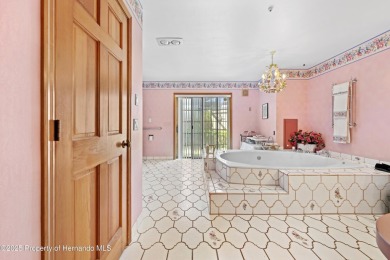 Located in the highly desirable Dogwood Estates golf course on Brooksville Country Club At Majestic Oaks in Florida - for sale on GolfHomes.com, golf home, golf lot