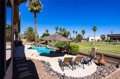 Welcome to 2175 Palmer Drive, Luxury living on the green in the on London Bridge Golf Course in Arizona - for sale on GolfHomes.com, golf home, golf lot