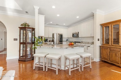 Beautifully maintained home located on a .23-acre lot in the on Magnolia Greens Golf Plantation in North Carolina - for sale on GolfHomes.com, golf home, golf lot