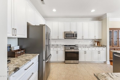 Beautifully maintained home located on a .23-acre lot in the on Magnolia Greens Golf Plantation in North Carolina - for sale on GolfHomes.com, golf home, golf lot