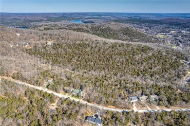 Own a serene slice of the Ozarks with 1.36 acres in Holiday on Holiday Island Executive Golf Course in Arkansas - for sale on GolfHomes.com, golf home, golf lot