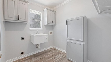 This exceptionally-updated 3 bedroom, 3 bathroom brick home in on Cedar Creek Country Club in Texas - for sale on GolfHomes.com, golf home, golf lot