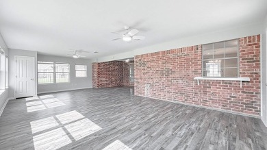 This exceptionally-updated 3 bedroom, 3 bathroom brick home in on Cedar Creek Country Club in Texas - for sale on GolfHomes.com, golf home, golf lot