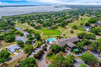 One or more photo(s) has been virtually staged. **This property on Harbor Hills Country Club in Florida - for sale on GolfHomes.com, golf home, golf lot