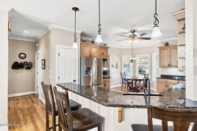 Designed for the best of coastal living! Impressive Sunset Beach on Sea Trail Golf Resort in North Carolina - for sale on GolfHomes.com, golf home, golf lot