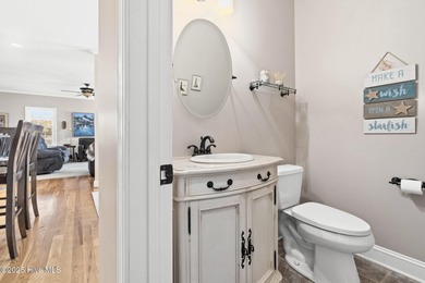 Designed for the best of coastal living! Impressive Sunset Beach on Sea Trail Golf Resort in North Carolina - for sale on GolfHomes.com, golf home, golf lot