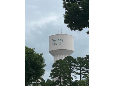 Own a serene slice of the Ozarks with 1.36 acres in Holiday on Holiday Island Executive Golf Course in Arkansas - for sale on GolfHomes.com, golf home, golf lot
