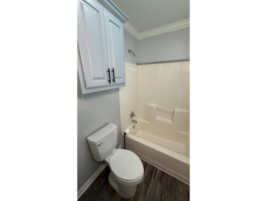 This exceptionally-updated 3 bedroom, 3 bathroom brick home in on Cedar Creek Country Club in Texas - for sale on GolfHomes.com, golf home, golf lot