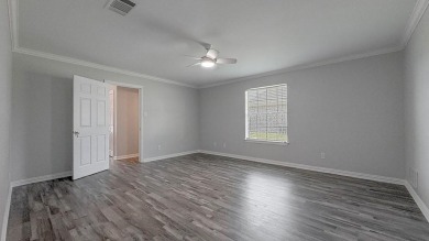 This exceptionally-updated 3 bedroom, 3 bathroom brick home in on Cedar Creek Country Club in Texas - for sale on GolfHomes.com, golf home, golf lot