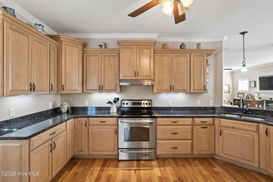 Designed for the best of coastal living! Impressive Sunset Beach on Sea Trail Golf Resort in North Carolina - for sale on GolfHomes.com, golf home, golf lot