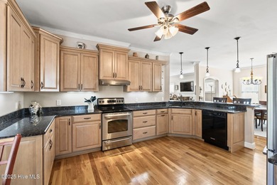 Designed for the best of coastal living! Impressive Sunset Beach on Sea Trail Golf Resort in North Carolina - for sale on GolfHomes.com, golf home, golf lot