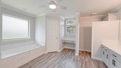 This exceptionally-updated 3 bedroom, 3 bathroom brick home in on Cedar Creek Country Club in Texas - for sale on GolfHomes.com, golf home, golf lot