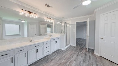 This exceptionally-updated 3 bedroom, 3 bathroom brick home in on Cedar Creek Country Club in Texas - for sale on GolfHomes.com, golf home, golf lot