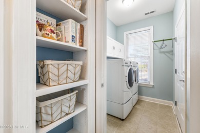 Beautifully maintained home located on a .23-acre lot in the on Magnolia Greens Golf Plantation in North Carolina - for sale on GolfHomes.com, golf home, golf lot