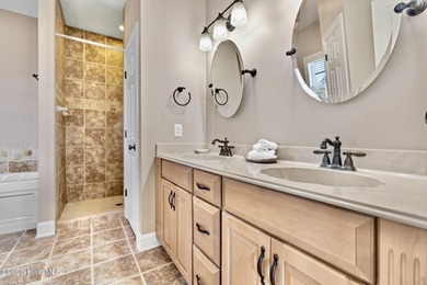 Designed for the best of coastal living! Impressive Sunset Beach on Sea Trail Golf Resort in North Carolina - for sale on GolfHomes.com, golf home, golf lot