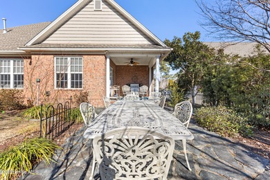 Beautifully maintained home located on a .23-acre lot in the on Magnolia Greens Golf Plantation in North Carolina - for sale on GolfHomes.com, golf home, golf lot
