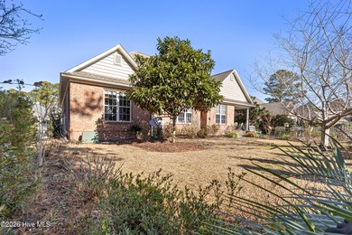 Beautifully maintained home located on a .23-acre lot in the on Magnolia Greens Golf Plantation in North Carolina - for sale on GolfHomes.com, golf home, golf lot