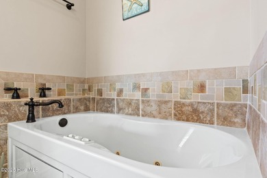 Designed for the best of coastal living! Impressive Sunset Beach on Sea Trail Golf Resort in North Carolina - for sale on GolfHomes.com, golf home, golf lot