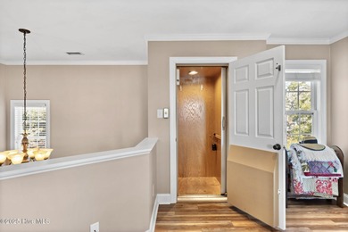 Designed for the best of coastal living! Impressive Sunset Beach on Sea Trail Golf Resort in North Carolina - for sale on GolfHomes.com, golf home, golf lot