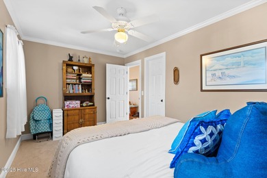 Designed for the best of coastal living! Impressive Sunset Beach on Sea Trail Golf Resort in North Carolina - for sale on GolfHomes.com, golf home, golf lot