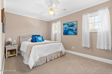 Designed for the best of coastal living! Impressive Sunset Beach on Sea Trail Golf Resort in North Carolina - for sale on GolfHomes.com, golf home, golf lot