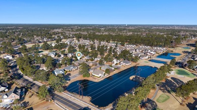 Beautifully maintained home located on a .23-acre lot in the on Magnolia Greens Golf Plantation in North Carolina - for sale on GolfHomes.com, golf home, golf lot
