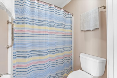 Designed for the best of coastal living! Impressive Sunset Beach on Sea Trail Golf Resort in North Carolina - for sale on GolfHomes.com, golf home, golf lot