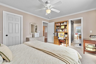 Designed for the best of coastal living! Impressive Sunset Beach on Sea Trail Golf Resort in North Carolina - for sale on GolfHomes.com, golf home, golf lot