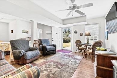 Designed for the best of coastal living! Impressive Sunset Beach on Sea Trail Golf Resort in North Carolina - for sale on GolfHomes.com, golf home, golf lot