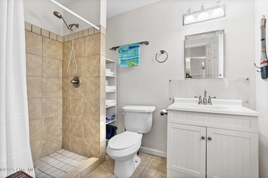 Designed for the best of coastal living! Impressive Sunset Beach on Sea Trail Golf Resort in North Carolina - for sale on GolfHomes.com, golf home, golf lot