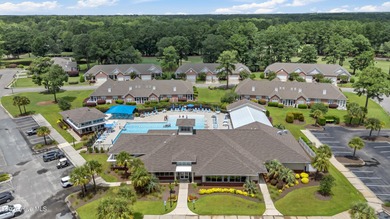 Beautifully maintained home located on a .23-acre lot in the on Magnolia Greens Golf Plantation in North Carolina - for sale on GolfHomes.com, golf home, golf lot