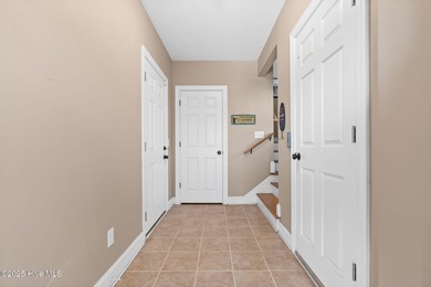 Designed for the best of coastal living! Impressive Sunset Beach on Sea Trail Golf Resort in North Carolina - for sale on GolfHomes.com, golf home, golf lot