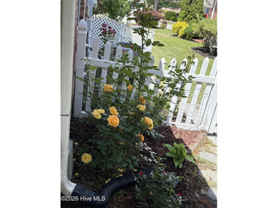 Beautifully maintained home located on a .23-acre lot in the on Magnolia Greens Golf Plantation in North Carolina - for sale on GolfHomes.com, golf home, golf lot