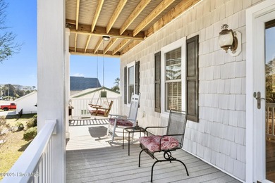 Designed for the best of coastal living! Impressive Sunset Beach on Sea Trail Golf Resort in North Carolina - for sale on GolfHomes.com, golf home, golf lot