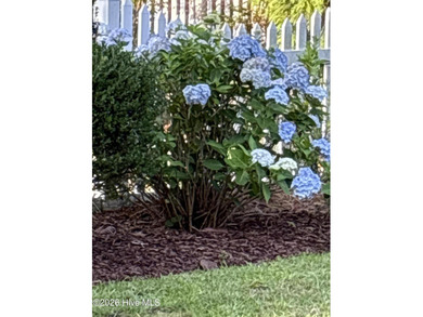 Beautifully maintained home located on a .23-acre lot in the on Magnolia Greens Golf Plantation in North Carolina - for sale on GolfHomes.com, golf home, golf lot