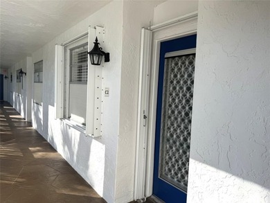 Discover the delightful charm of this distinctive property on Wynmoor Golf Course in Florida - for sale on GolfHomes.com, golf home, golf lot